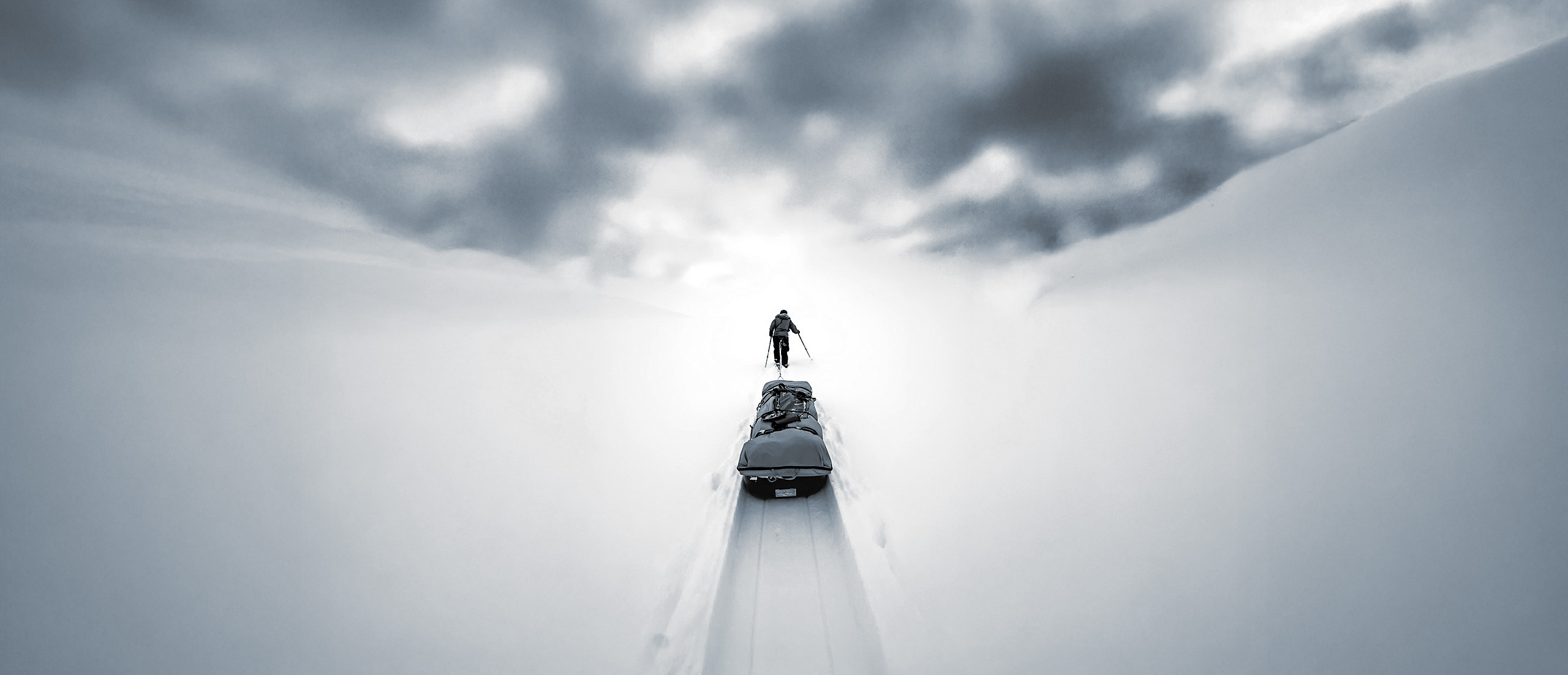 Gerry van der Walt hauling a sled across the ice in Svalbard, training for the road to the South Pole.
