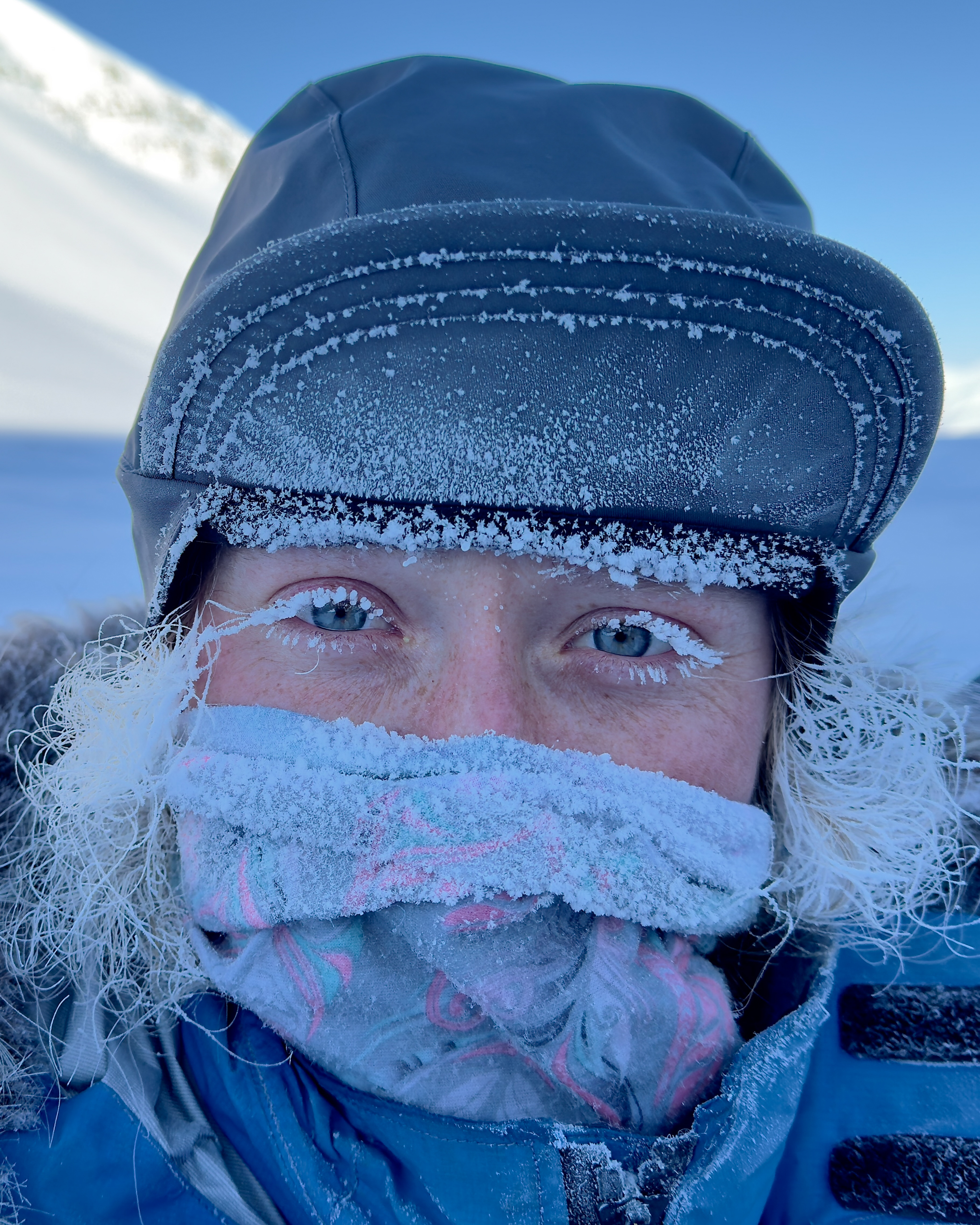 Mardi Philips on the ice, frost on her cap and eyelashes